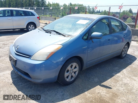 2007 Toyota Prius with VIN JTDKB20U877616564, listed as a IAAI auction lot 42410078 with 335,498 mi miles and . Bid and sale history available at DreamBid. Image 2.