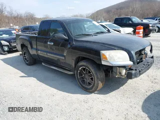 2006 Mitsubishi Raider LS with VIN 1Z7HC22K56S561574, listed as a IAAI auction lot 41757412 with 216,559 mi miles. Bid and sale history available at carsss.com. Image 1.