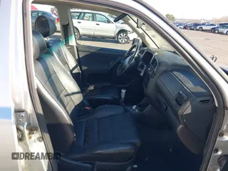1999 Volkswagen Golf z VIN 3VWJA81HXXM215507, wystawiony jako IAAI lot #41391464 z przebiegiem 167 875 mil mil oraz . Historia ofert i sprzedaży dostępna na DreamBid. Obrazek 5.