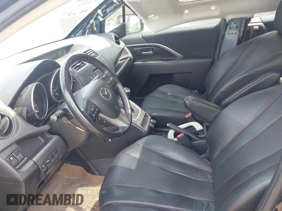 2014 Mazda 5 Grand Touring z VIN JM1CW2DL9E0171350, wystawiony jako IAAI lot #42113779 z przebiegiem 90 120 mil mil oraz . Historia ofert i sprzedaży dostępna na DreamBid. Obrazek 5.