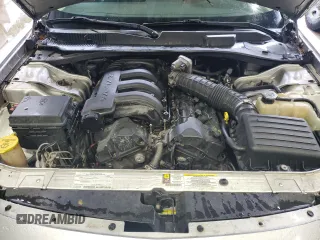 2008 Dodge Charger z VIN 2B3KA43R28H278186, wystawiony jako Copart lot #54450995 z przebiegiem 255 044 mil mil oraz Szkoda całkowita • Salvage title. Historia ofert i sprzedaży dostępna na DreamBid. Obrazek 11.