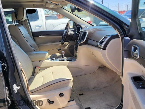 2014 Jeep Grand Cherokee Overland with VIN 1C4RJFCT7EC187319, listed as a Copart auction lot 55284615 with 98,314 mi miles and Clean Title. Bid and sale history available at DreamBid. Image 5.