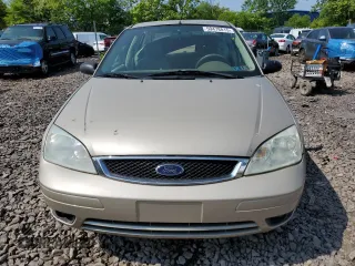 2006 Ford Focus S z VIN 1FAFP34N96W111431, wystawiony jako Copart lot #59478815 z przebiegiem Nie podano mil oraz Szkoda całkowita • Salvage title. Historia ofert i sprzedaży dostępna na DreamBid. Obrazek 5.