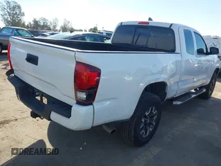 2018 Toyota Tacoma SR with VIN 5TFRX5GN9JX106232, listed as a IAAI auction lot 41634120 with 66,674 mi miles and . Bid and sale history available at DreamBid. Image 4.