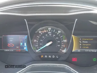 2016 Ford Fusion Titanium z VIN 3FA6P0SU1GR116118, wystawiony jako IAAI lot #42685489 z przebiegiem 138 690 mil mil oraz . Historia ofert i sprzedaży dostępna na DreamBid. Obrazek 7.