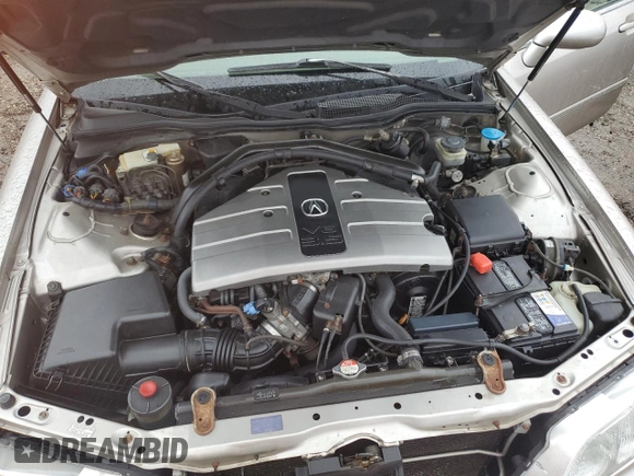 1996 Acura RL Premium with VIN JH4KA9652TC012200, listed as a Copart auction lot 47738615 with 145,330 mi miles and Salvage Title. Bid and sale history available at DreamBid. Image 11.