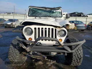 2005 Jeep Wrangler Rubicon with VIN 1J4FA69S05P306428, listed as a Copart auction lot 86441714 with 74,174 mi miles and Salvage Title. Bid and sale history available at carsss.com. Image 5.