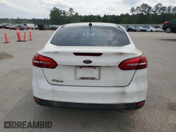2018 Ford Focus S with VIN 1FADP3E25JL307761, listed as a Copart auction lot 52983485 with 113,217 mi miles and Clean Title. Bid and sale history available at carsss.com. Image 6.