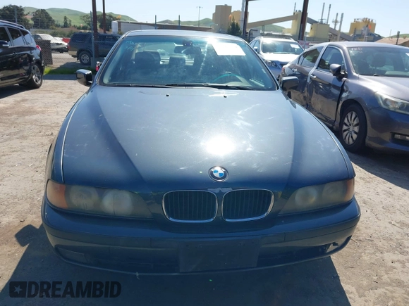 2000 BMW 5 Series 528iA with VIN WBADM6343YGV01651, listed as a IAAI auction lot 41745574 with 143,898 mi miles. Bid and sale history available at carsss.com. Image 12.