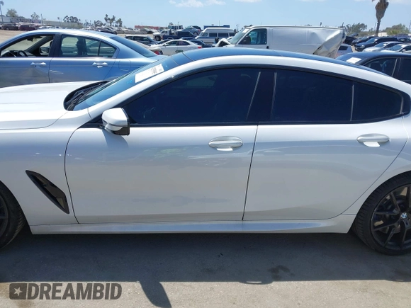 2022 BMW 8 Series M850i z VIN WBAGV8C02NCH87808, wystawiony jako IAAI lot #42255995 z przebiegiem 34 285 mil mil oraz . Historia ofert i sprzedaży dostępna na DreamBid. Obrazek 14.