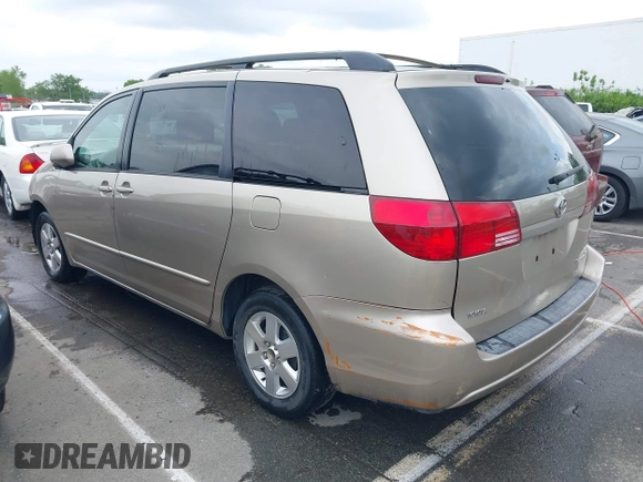 2004 Toyota Sienna XLE with VIN 5TDZA22CX4S205206, listed as a IAAI auction lot 42007779 with 173,794 mi miles. Bid and sale history available at carsss.com. Image 3.