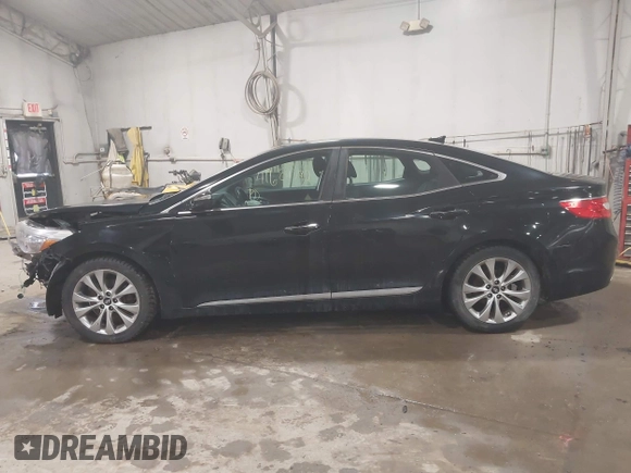 2013 Hyundai Azera z VIN KMHFG4JG4DA218608, wystawiony jako IAAI lot #41601792 z przebiegiem 101 846 mil mil oraz . Historia ofert i sprzedaży dostępna na DreamBid. Obrazek 14.