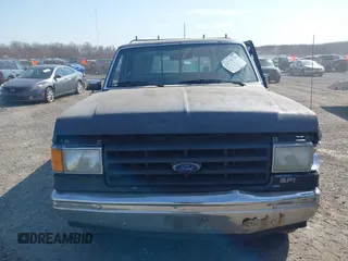 1987 Ford F-150 with VIN 2FTDF15Y2HCB10816, listed as a IAAI auction lot 41770760 with 86,290 mi miles. Bid and sale history available at carsss.com. Image 12.