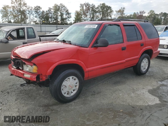 1996 GMC Jimmy SL z VIN 1GKDT13WXT2502347, wystawiony jako Copart lot #74502444 z przebiegiem 253 735 mil mil oraz Szkoda całkowita • Salvage title. Historia ofert i sprzedaży dostępna na DreamBid. Obrazek 1.