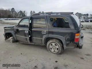 2003 Chevrolet Tahoe Z71 with VIN 1GNEK13T03R124255, listed as a Copart auction lot 42002945 with 205,965 mi miles and Salvage Title. Bid and sale history available at carsss.com. Image 2.