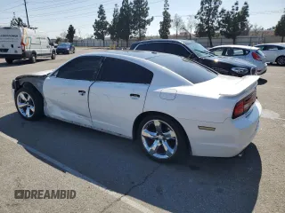 2013 Dodge Charger SE z VIN 2C3CDXBG3DH549962, wystawiony jako Copart lot #55110985 z przebiegiem 183 071 mil mil oraz Szkoda całkowita • Salvage title. Historia ofert i sprzedaży dostępna na DreamBid. Obrazek 2.