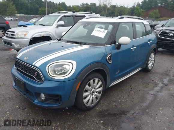 2019 MINI Countryman Cooper S with VIN WMZYT5C52K3G93902, listed as a IAAI auction lot 42650523 with 99,538 mi miles and . Bid and sale history available at DreamBid. Image 2.