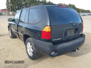 2006 GMC Envoy SLT with VIN 1GKDS13SX62260454, listed as a IAAI auction lot 41479478 with 255,019 mi miles. Bid and sale history available at carsss.com. Image 3.