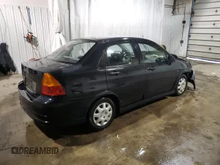 2003 Suzuki Aerio S z VIN JS2RA41S035159741, wystawiony jako Copart lot #88080235 z przebiegiem Nie podano mil oraz Szkoda całkowita • Salvage title. Historia ofert i sprzedaży dostępna na DreamBid. Obrazek 3.