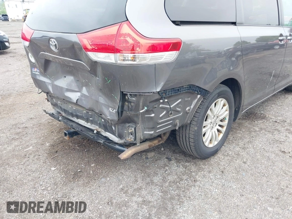 2014 Toyota Sienna XLE with VIN 5TDYK3DC0ES436502, listed as a IAAI auction lot 42180990 with 154,839 mi miles and . Bid and sale history available at DreamBid. Image 18.