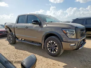 2021 Nissan Titan Pro-4X with VIN 1N6AA1EDXMN523826, listed as a Copart auction lot 61851765 with 85,783 mi miles and Salvage title. Bid and sale history available at DreamBid. Image 4.