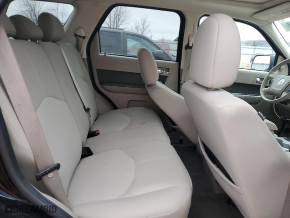 2009 Mercury Mariner with VIN 4M2CU81759KJ06063, listed as a Copart auction lot 85241434 with 118,191 mi miles and Non Repairable. Bid and sale history available at carsss.com. Image 10.
