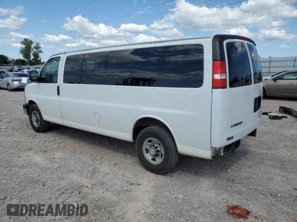 2013 Chevrolet Express Passenger LT with VIN 1GAZG1FG9D1189947, listed as a Copart auction lot 54183165 with 84,745 mi miles and Salvage title. Bid and sale history available at DreamBid. Image 2.