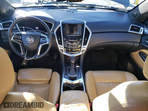 2014 Cadillac SRX Premium Collection z VIN 3GYFNGE37ES566089, wystawiony jako Copart lot #83595454 z przebiegiem 209 155 mil mil oraz Szkody całkowita. Historia ofert i sprzedaży dostępna na DreamBid. Obrazek 8.