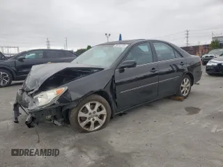 2005 Toyota Camry LE with VIN 4T1BF32K45U102615, listed as a Copart auction lot 56182705 with 196,300 mi miles and Salvage Title. Bid and sale history available at DreamBid. Image 1.