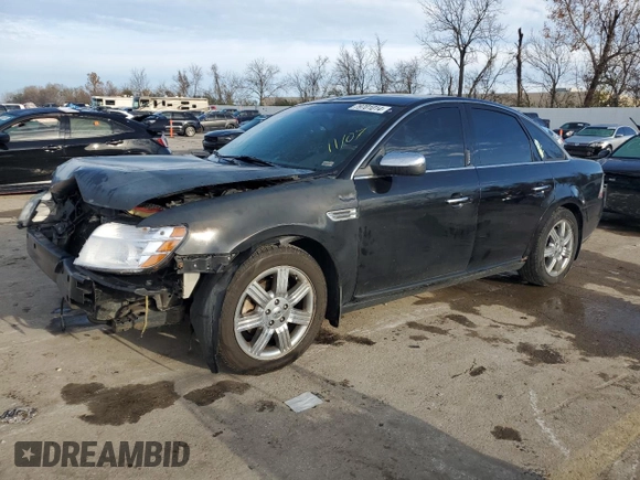2008 Ford Taurus Limited with VIN 1FAHP25W38G181594, listed as a Copart auction lot 79701014 with 129,968 mi miles and Salvage Title. Bid and sale history available at carsss.com. Image 1.