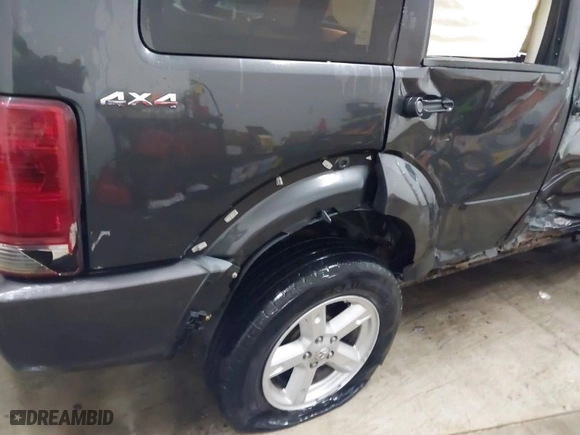 2010 Dodge Nitro SXT with VIN 1D4PU5GK0AW126478, listed as a IAAI auction lot 41362674 with 171,704 mi miles. Bid and sale history available at carsss.com. Image 18.