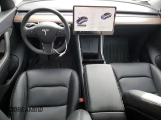 2020 Tesla Model Y Long Range z VIN 5YJYGDEE8LF029553, wystawiony jako Copart lot #51010665 z przebiegiem 42 877 mil mil oraz Szkoda całkowita • Salvage title. Historia ofert i sprzedaży dostępna na DreamBid. Obrazek 8.