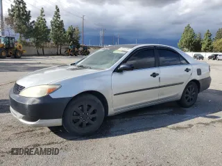 2004 Toyota Camry LE with VIN JTDBF32K240156831, listed as a Copart auction lot 49248295 with 141,430 mi miles and Salvage Title. Bid and sale history available at carsss.com. Image 1.
