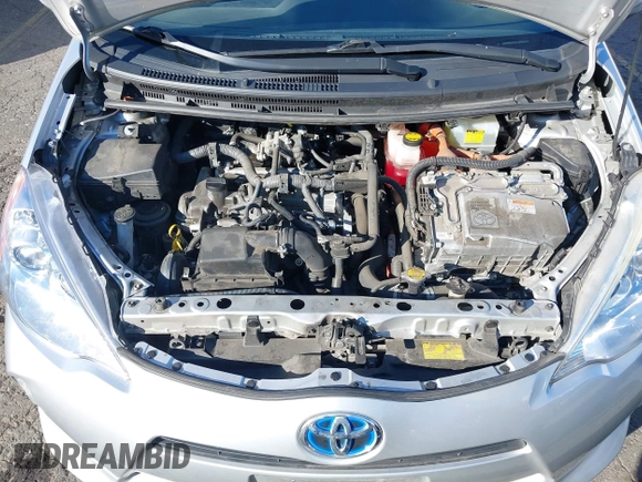 2014 Toyota Prius One z VIN JTDKDTB32E1574607, wystawiony jako IAAI lot #41724312 z przebiegiem 102 612 mil mil oraz . Historia ofert i sprzedaży dostępna na DreamBid. Obrazek 10.