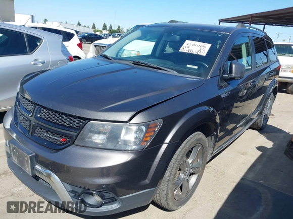 2017 Dodge Journey Crossroad Plus z VIN 3C4PDDGG3HT560915, wystawiony jako IAAI lot #42483896 z przebiegiem 130 588 mil mil oraz . Historia ofert i sprzedaży dostępna na DreamBid. Obrazek 18.