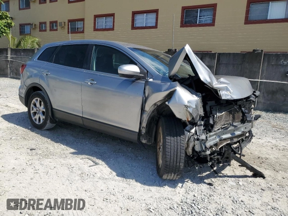 2015 Mazda CX-9 Touring with VIN JM3TB2CA6F0453398, listed as a Copart auction lot 55897115 with 167,563 mi miles and Salvage title. Bid and sale history available at DreamBid. Image 4.