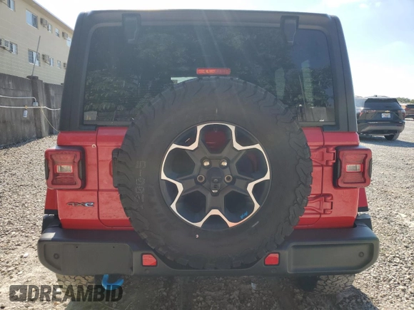 2022 Jeep Wrangler Unlimited Rubicon with VIN 1C4JJXR63NW187448, listed as a Copart auction lot 52911385 with 32,442 mi miles and Salvage title. Bid and sale history available at DreamBid. Image 6.