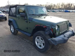 2016 Jeep Wrangler Sport with VIN 1C4AJWAG7GL330159, listed as a IAAI auction lot 41530415 with 98,554 mi miles and . Bid and sale history available at carsss.com. Image 1.