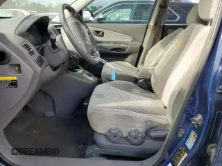 2005 Hyundai Tucson GLS with VIN KM8JN12D95U051374, listed as a Copart auction lot 73854704 with 0 mi miles and Salvage Title. Bid and sale history available at carsss.com. Image 7.