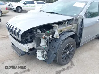 2014 Jeep Cherokee Latitude with VIN 1C4PJLCS1EW105984, listed as a IAAI auction lot 42242732 with 89,325 mi miles and . Bid and sale history available at DreamBid. Image 6.