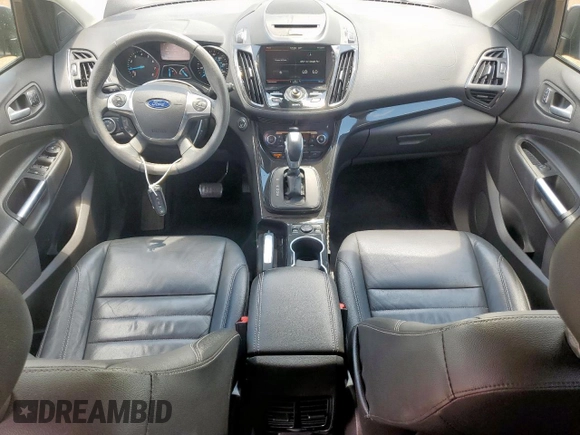 2015 Ford Escape Titanium with VIN 1FMCU0J92FUB80769, listed as a Copart auction lot 61988435 with 103,212 mi miles and Salvage title. Bid and sale history available at DreamBid. Image 8.
