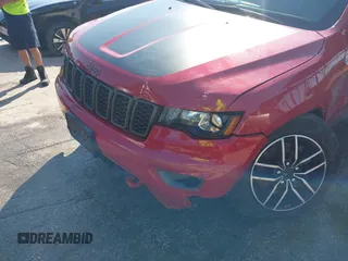 2021 Jeep Grand Cherokee Trailhawk with VIN 1C4RJFLG8MC549403, listed as a IAAI auction lot 42538177 with 33,124 mi miles and . Bid and sale history available at DreamBid. Image 6.