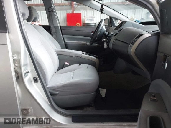 2005 Toyota Prius with VIN JTDKB22U353110142, listed as a IAAI auction lot 42197390 with 254,471 mi miles and . Bid and sale history available at DreamBid. Image 5.