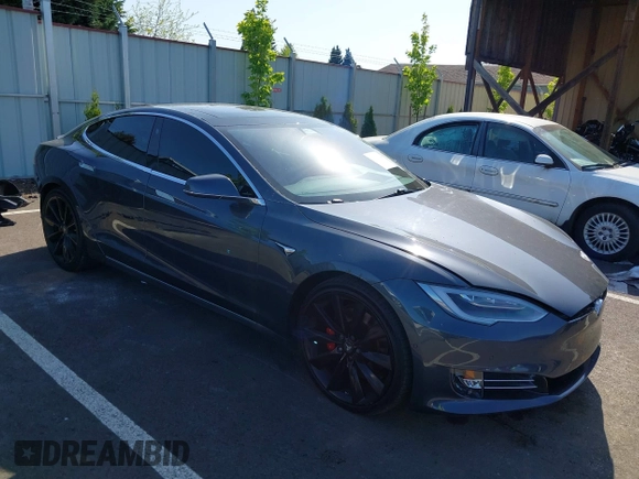 2017 Tesla Model S 100D with VIN 5YJSA1E49HF189008, listed as a IAAI auction lot 42051518 with 49,145 mi miles and . Bid and sale history available at DreamBid. Image 1.