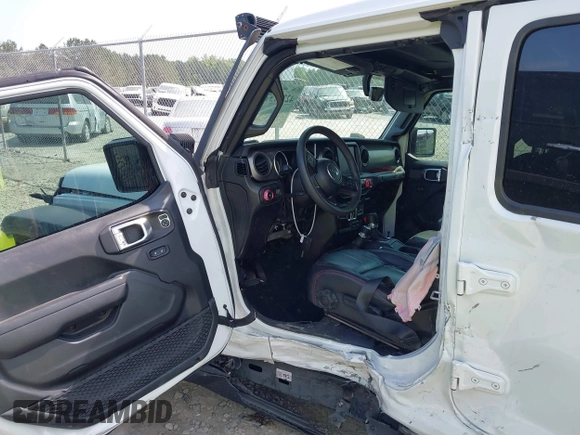 2023 Jeep Wrangler Willys z VIN 1C4HJXDG9PW545749, wystawiony jako IAAI lot #42307373 z przebiegiem 44 176 mil mil oraz . Historia ofert i sprzedaży dostępna na DreamBid. Obrazek 6.