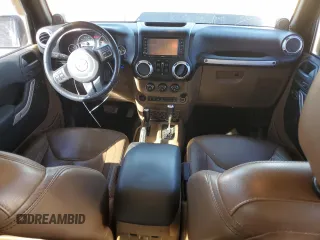 2014 Jeep Wrangler Unlimited Rubicon X with VIN 1C4HJWFG8EL119654, listed as a Copart auction lot 46699055 with 148,412 mi miles and Salvage title. Bid and sale history available at DreamBid. Image 8.
