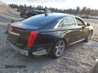 2017 Cadillac XTS Luxury with VIN 2G61M5S30H9159277, listed as a IAAI auction lot 41225371 with 125,523 mi miles. Bid and sale history available at carsss.com. Image 4.