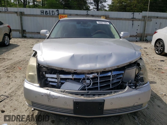 2009 Cadillac DTS 1SA z VIN 1G6KD57Y69U114700, wystawiony jako Copart lot #56007485 z przebiegiem 158 849 mil mil oraz Szkoda całkowita • Salvage title. Historia ofert i sprzedaży dostępna na DreamBid. Obrazek 5.