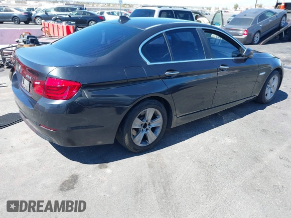 2013 BMW 5 Series 528i with VIN WBAXG5C58DD232582, listed as a IAAI auction lot 41890082 with 150,401 mi miles and . Bid and sale history available at carsss.com. Image 4.