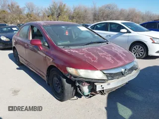 2010 Honda Civic LX with VIN 2HGFA1F59AH511964, listed as a IAAI auction lot 41387990 with 247,880 mi miles and . Bid and sale history available at DreamBid. Image 1.